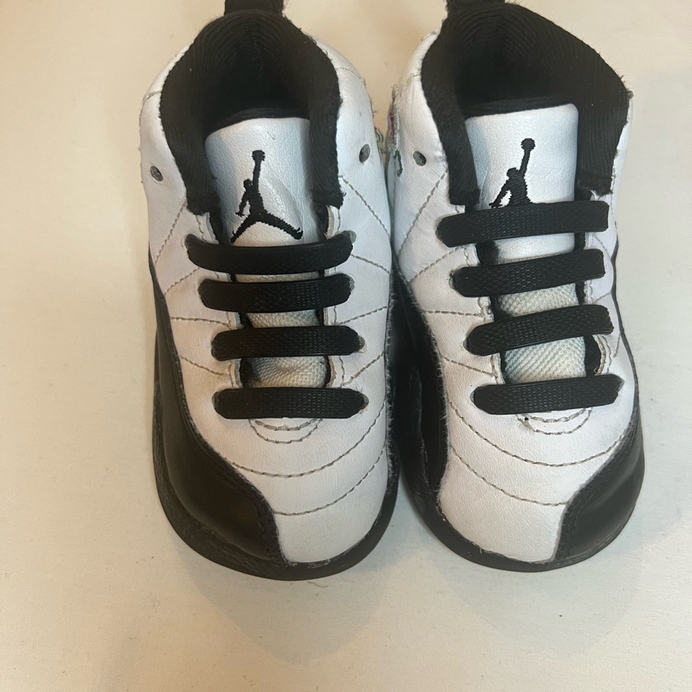 Toddlers Nike Jordans Black and White Sneakers with Flower Design